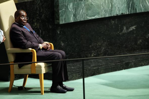 490451702-zimbabwes-president-robert-mugabe-sits-before-speaking.jpg.CROP.promovar-mediumlarge